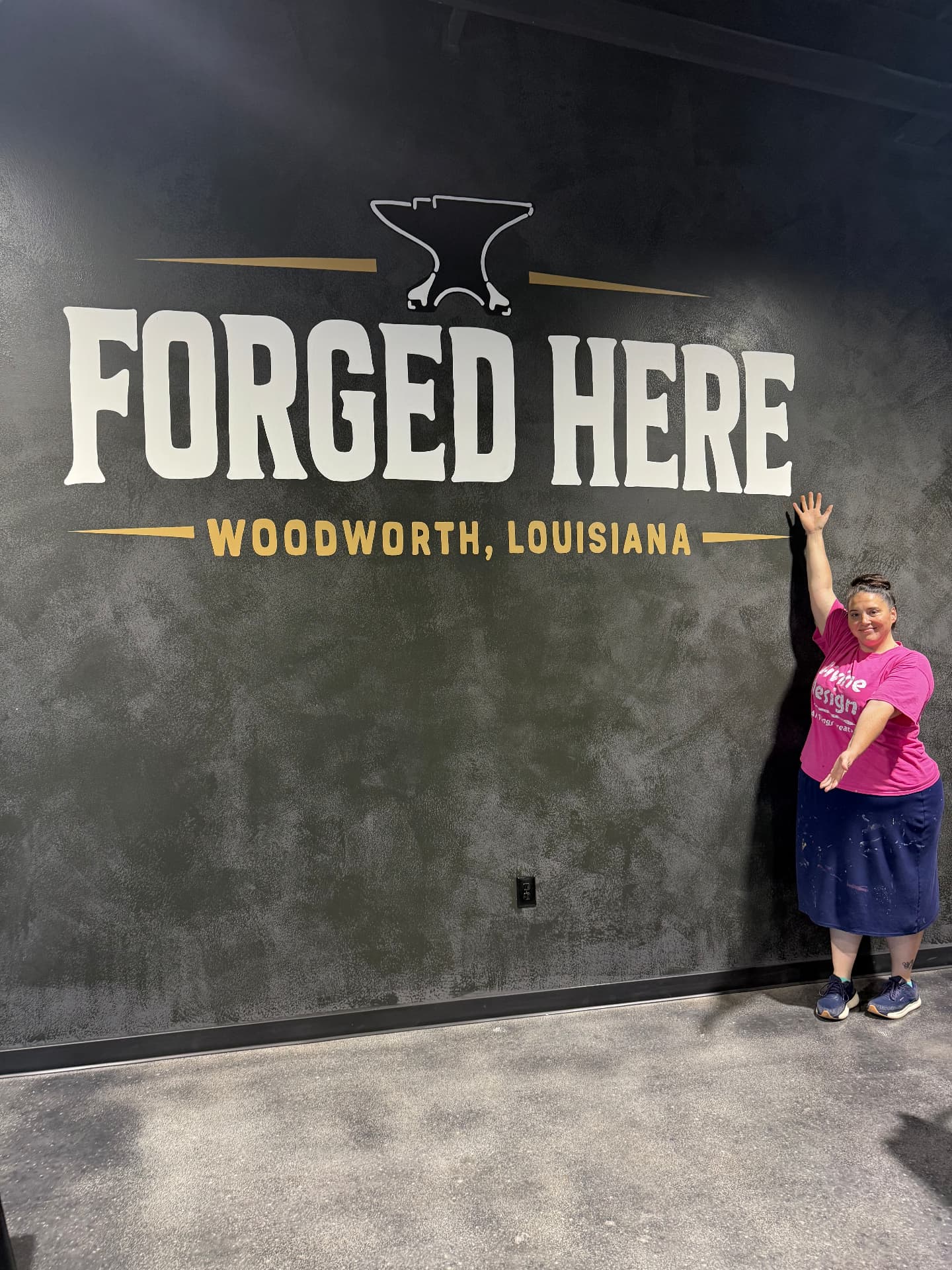 Forged Here — a big bold mural for Southern Iron Fitness in Woodworth, Louisiana.